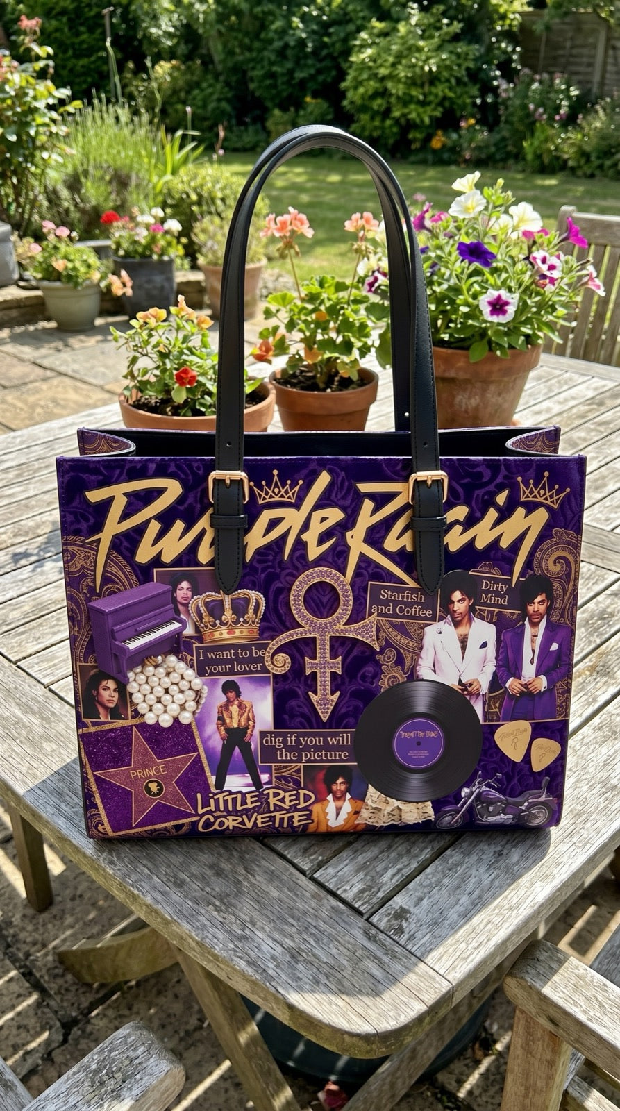 Prince gold love symbol tote on table